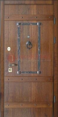 Темная стальная дверь с массивом дуба с ковкой ДМД-37 в Калуге